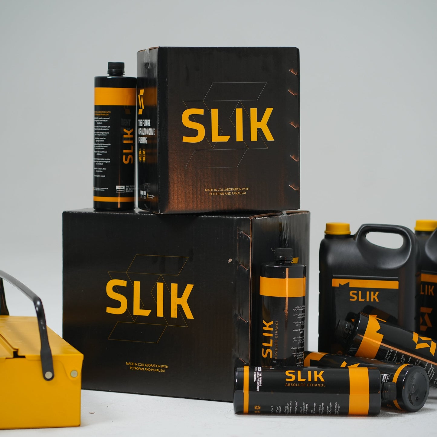 SLIK products including bottles, boxes, and cans on a gray background