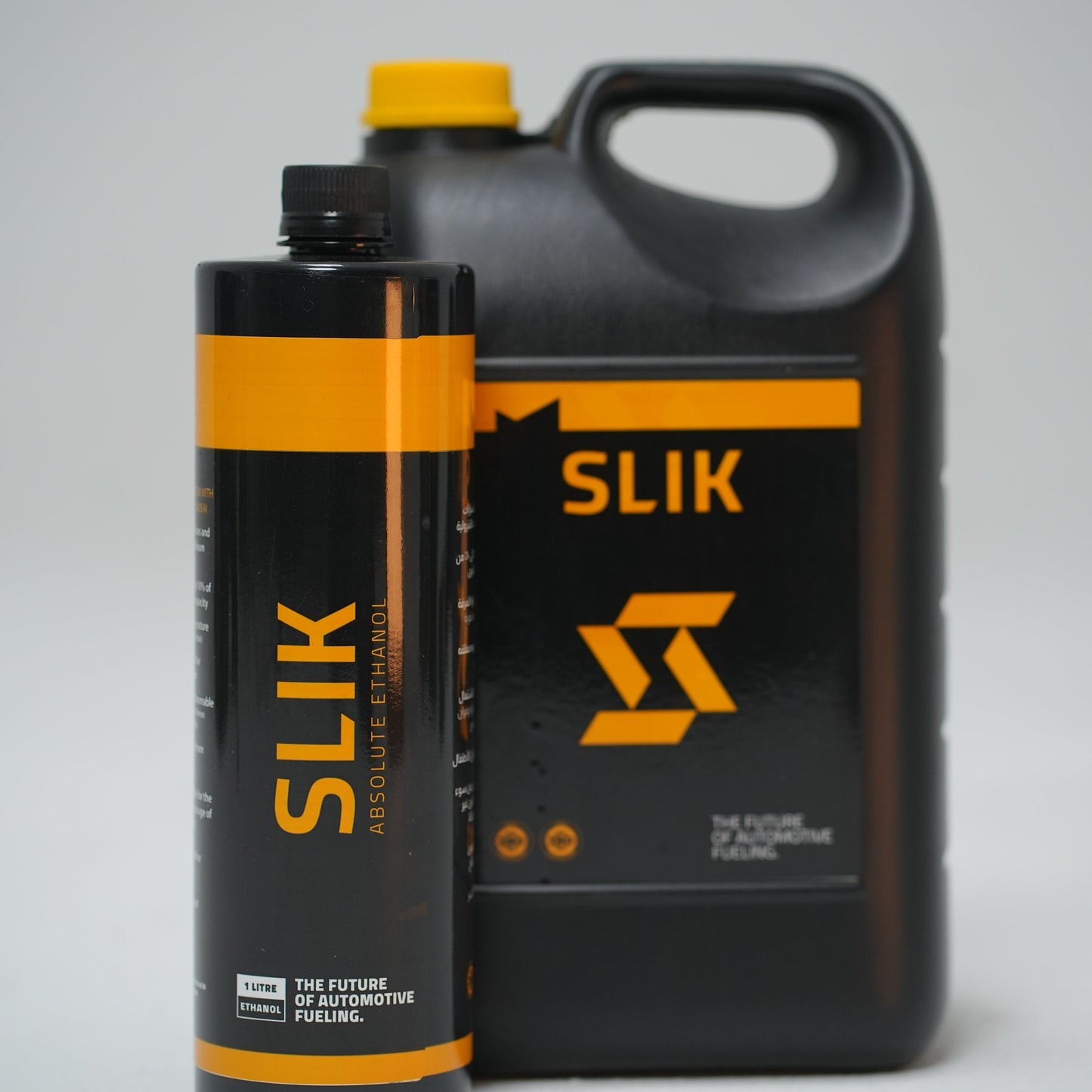 Two containers of Slik Absolute Ethanol on a white background